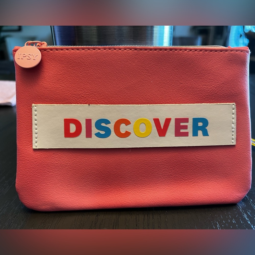 Ipsy Glambag in an Orange/Coral Color, NEW Never Used